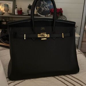 Black, large designer bag
